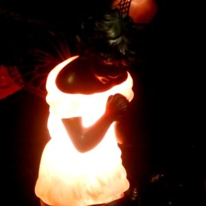 Angel fairy that lights up, she is beautiful praying.